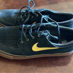 Nike Black and Gold Sneakers